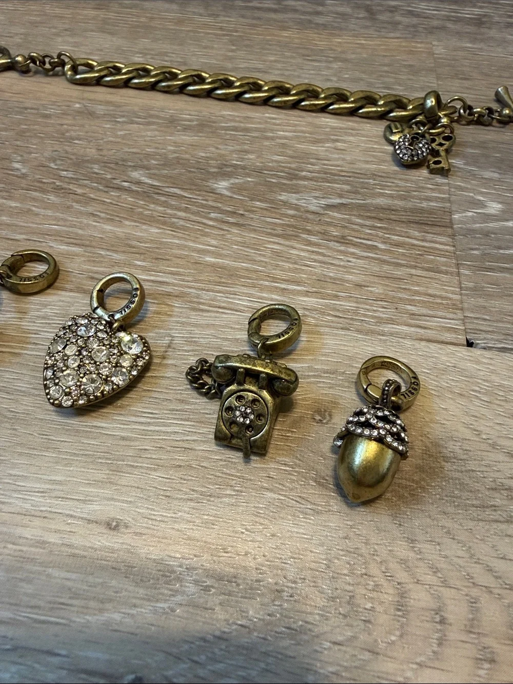 Fossil Gold Tone Charm Bracelet 5 Charms Toggle Metal Retired